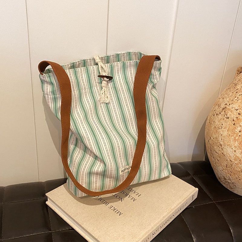 Large capacity canvas bag for women 2025 new summer fashion casual armpit bag commuting shoulder tote bag