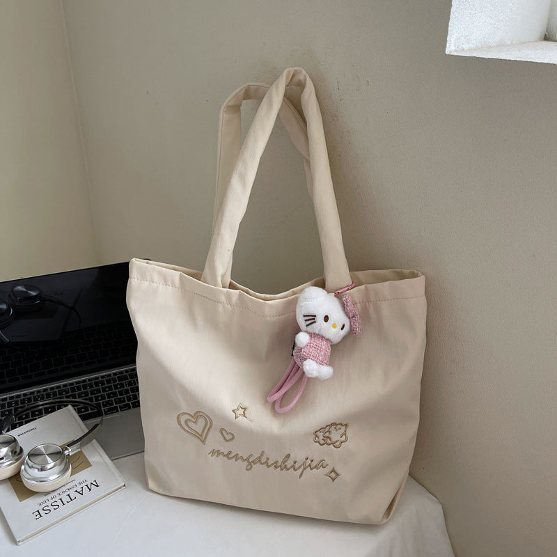 Large capacity bag for women's autumn and winter versatile 2025 new simple canvas shoulder shopping bag, student class tote bag