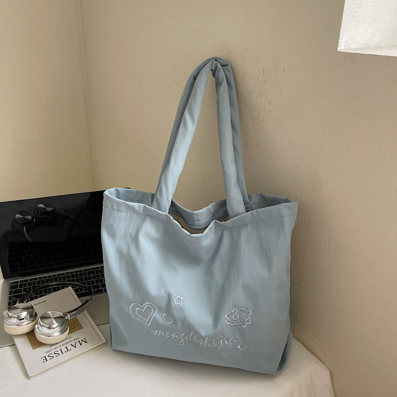 Large capacity bag for women's autumn and winter versatile 2025 new simple canvas shoulder shopping bag, student class tote bag