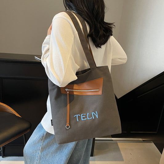 Korean casual college style canvas bag, women's seasonal new fashion tote bag, casual large capacity shoulder bag