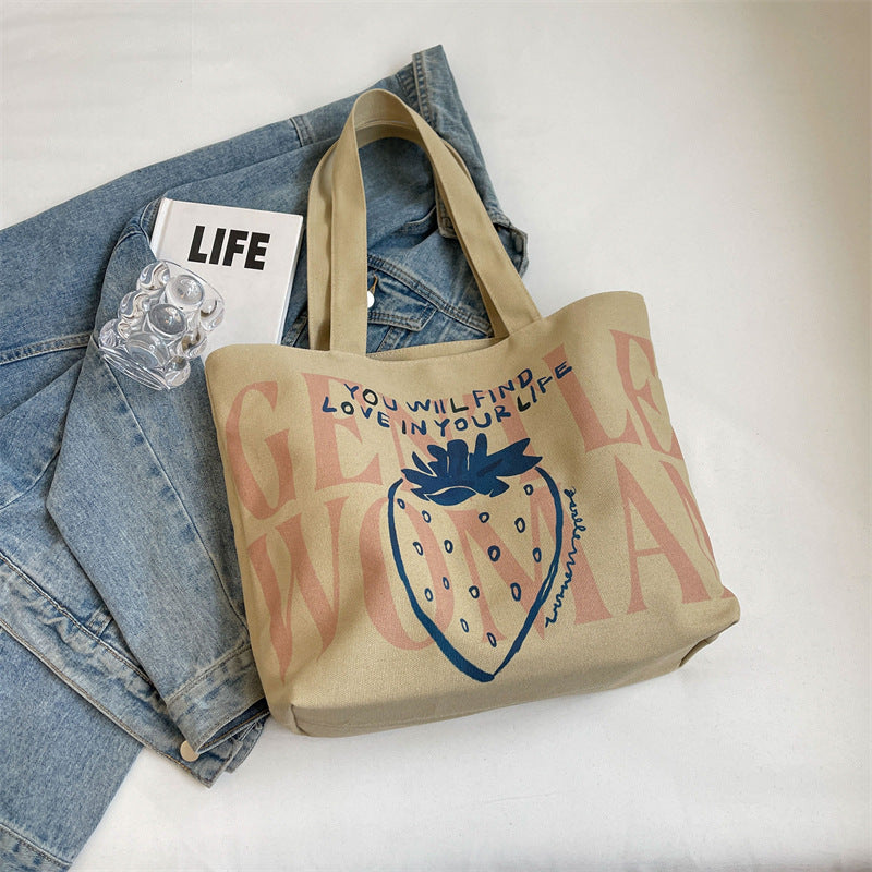 Letter canvas bag 2025 new strawberry print Gentle Woman shoulder bag commuting tote bag