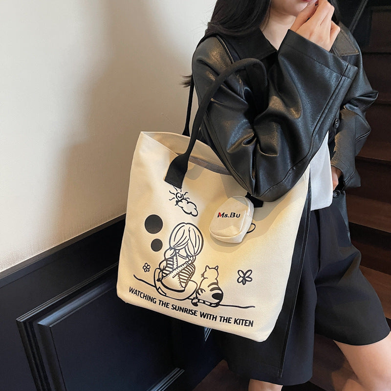 Korean printed canvas bag, women's versatile casual handbag, 2025 new model, is a brush order large capacity shoulder bag