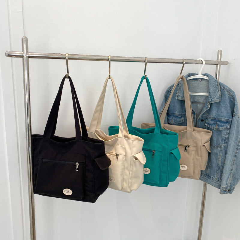 Single shoulder bag, women's large capacity versatile canvas bag, student simple handbag, casual crossbody bag, tutoring bag, mommy bag