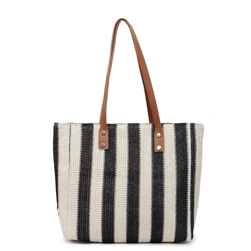 Large capacity fashionable hand-held woven bag for women's cross-border new Korean version striped shoulder bag for vacation and leisure beach bag