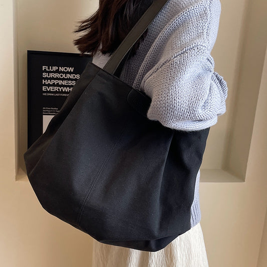 Large capacity canvas bag for women in autumn and winter 2025, fashionable and casual single shoulder handbag, student class commuting tote bag