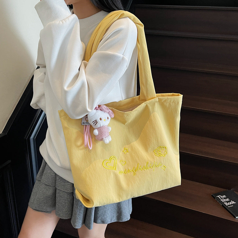 Large capacity bag for women's autumn and winter versatile 2025 new simple canvas shoulder shopping bag, student class tote bag