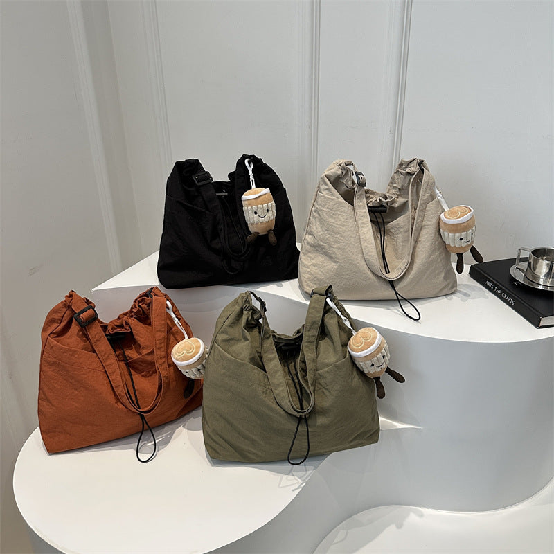 Large capacity drawstring bucket bag for women 2024 new Japanese ins casual crossbody bag street shoulder commuting bag