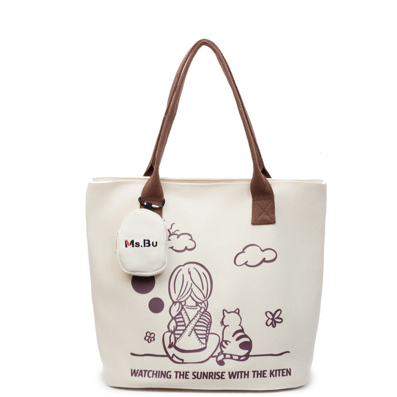 Korean printed canvas bag, women's versatile casual handbag, 2025 new model, is a brush order large capacity shoulder bag