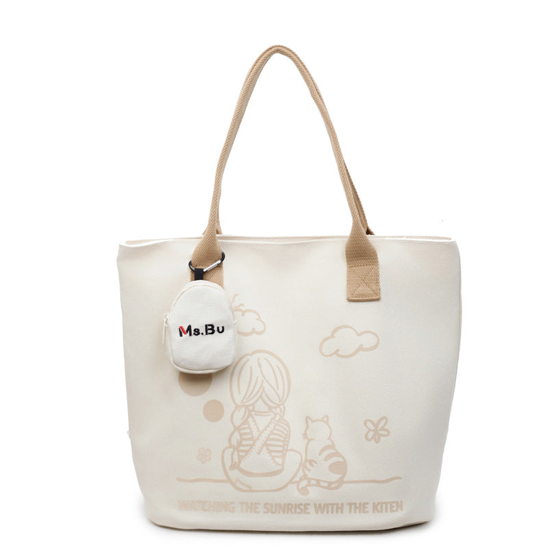Korean printed canvas bag, women's versatile casual handbag, 2025 new model, is a brush order large capacity shoulder bag