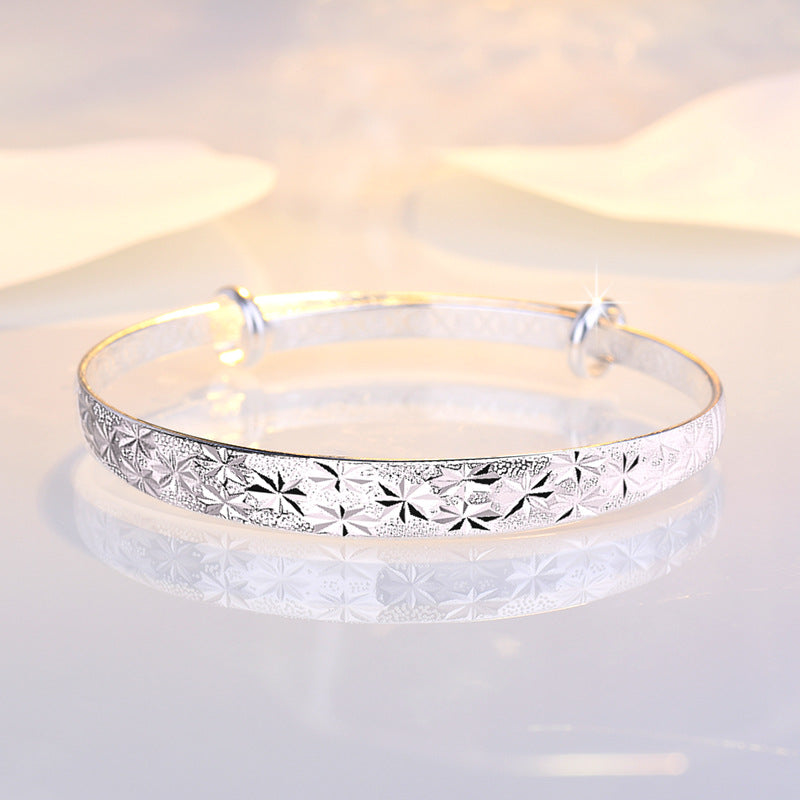 Graceful Star-Engraved Silver Bangle for Women